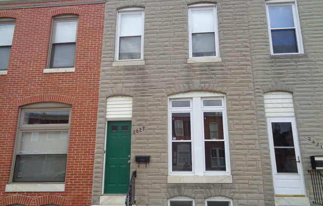 2623 Fait Ave/2 bed/1.5 bath Townhouse with Den and Backyard in the Heart of Canton