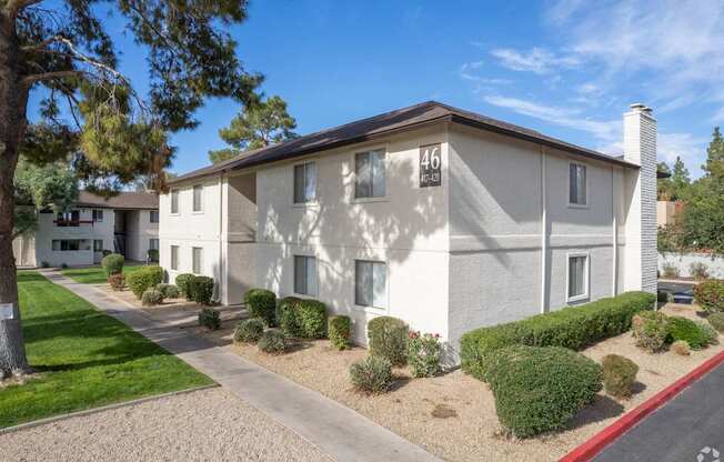 A white building with the number 46 on it.