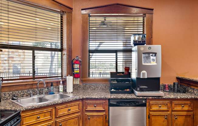 the kitchen has granite counter tops and stainless steel appliances at The Verandah, Texas