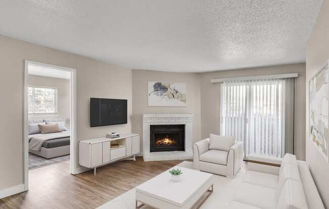 Living Room with Fireplace at Verona Apartments in Littleton, CO