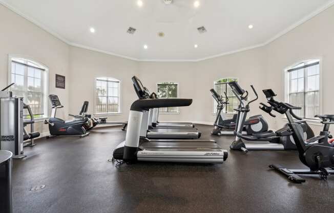 Free weights and fitness equipment in the 24 hour gym at Ballantrae Apartments