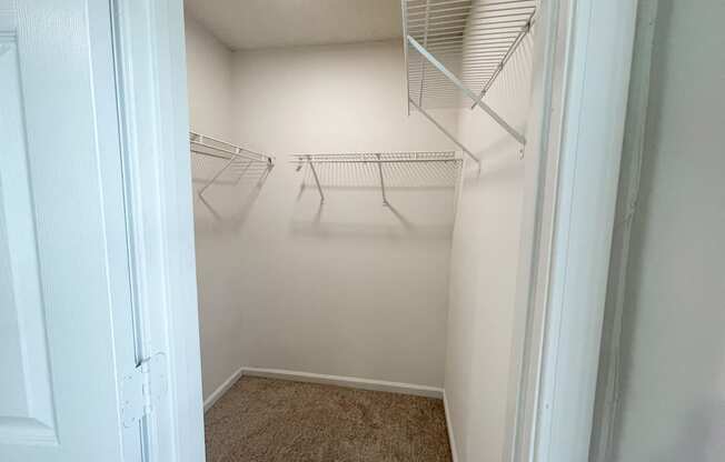 The Crest at Berkeley Lake St James renovated main bedroom walk in closet located in Duluth, GA 30096
