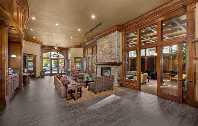 a large living room with furniture and a fireplace