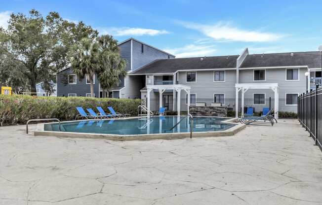 our resort style swimming pool is in front of our house and next to our yard