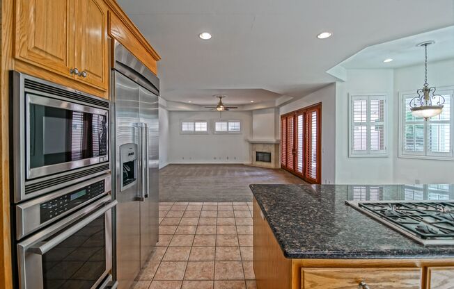 VERY SPACIOUS, BRIGHT & AIRY HOME W/ UNIQUE SUN ROOM, SPACIOUS REAR YARD/PATIO & 2-CAR GARAGE CLOSE TO SCHOOLS, SHOPPING, FREEWAY ACCESS & 5 MINS TO BEACH!