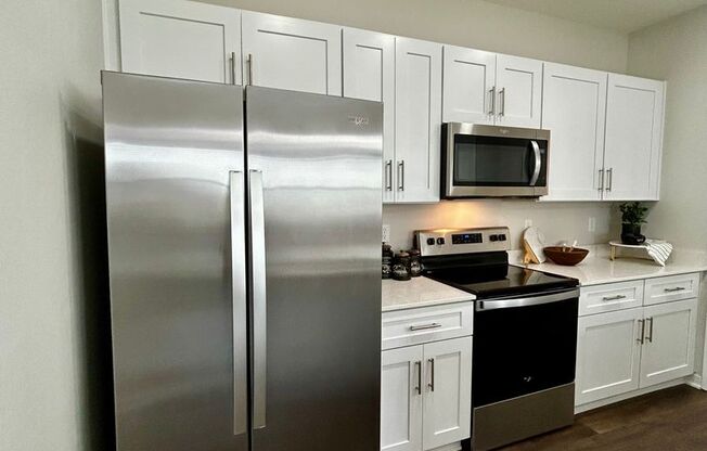 2 beds, 2.5 baths, 1,416 sqft, $2,595, Unit MODEL 10222 S 130th Court Unit 102 B1416 MEWS House with 2 Car Garage A9