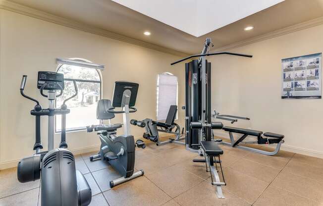 the gym at the enclave at woodbridge apartments in sugar land, tx