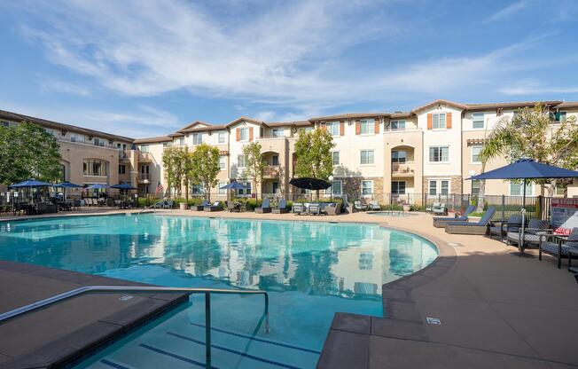 a large pool of water in front of a building