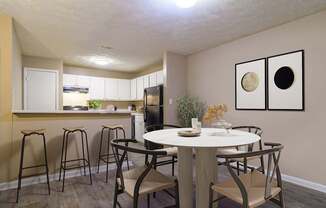 Spacious dining room at Stratford Ridge Apartments near Smyrna, GA, designed for comfortable meals and entertaining with plenty of natural light.