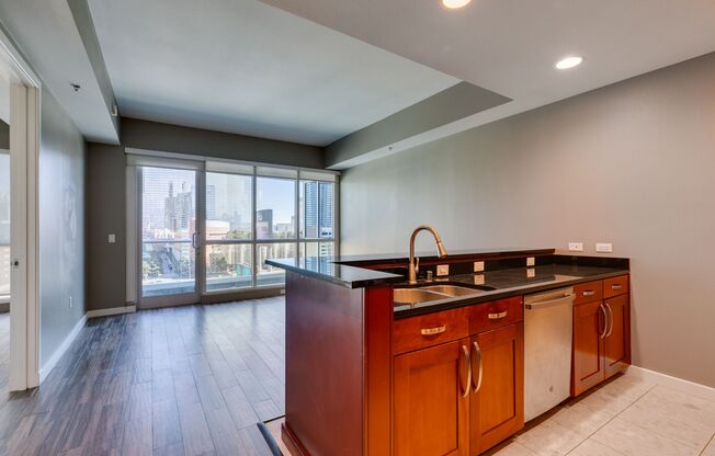 Iconic Strip-View Luxury | Elegant 1BR + Den High-Rise Residence