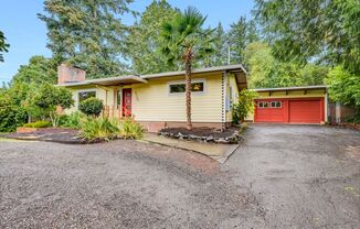 Beautifully remodeled 3 bed, 2 bath ranch style with a huge, fenced yard!