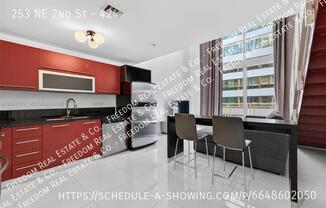 253 NE 2 St