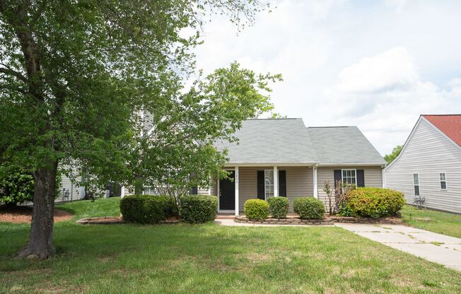 Charming 3 bedroom 2 bath ranch style home in Greensboro with covered front porch!