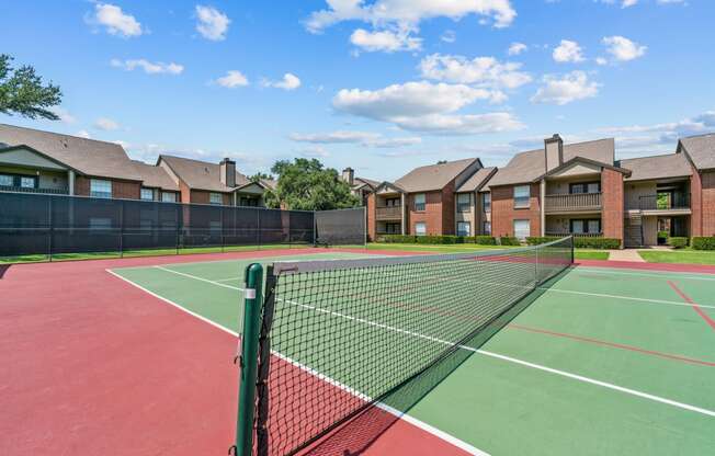 take advantage of the tennis courts at the whispering winds apartments in pearland, tx