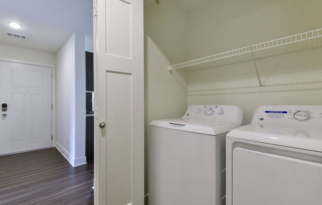 a laundry room with a washer and dryer at Chase Creek Apartment Homes, Huntsville, 35811