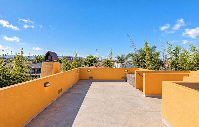 SPACIOUS & SECLUDED, SPANISH MEDITERRANEAN REAR UNIT TOWNHOUSE W/ LARGE ROOFTOP DECK W/ OCEAN/PV VIEWS, 2 BALCONIES, WRAP AROUND YARD & 2-CAR GARAGE ON CUL-DE-SAC STREET CLOSE TO SCHOOLS, SHOPPING, RB PIER & BEACH!