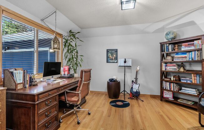 Beautiful bright home with large yard, finished basement + office!