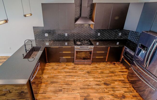 Three Bedroom Modern Olde Kensington Condo with Roofdeck