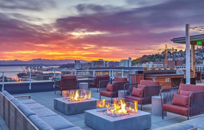 Rooftop view at night with Fire pits