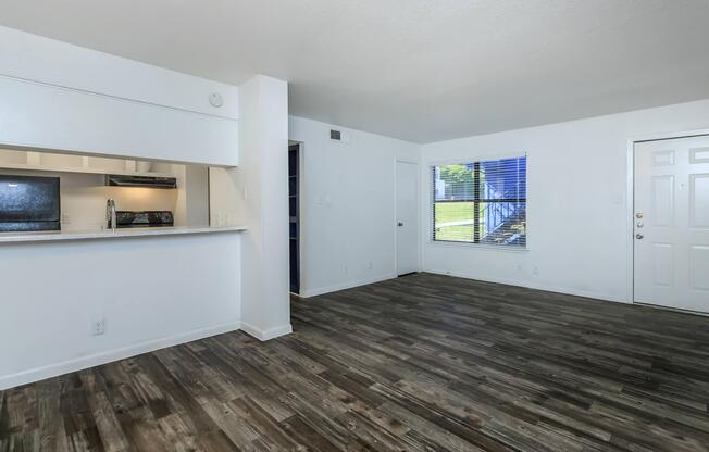 a kitchen with a wood floor