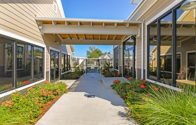 the preserve at ballantyne commons community walkway and patio at Crossgates Apartment Homes, Starkville, MS
