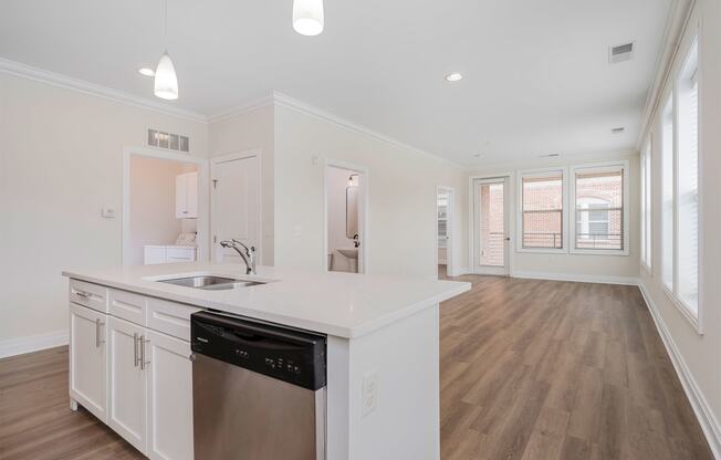 a kitchen and living room in a 555 waverly unit