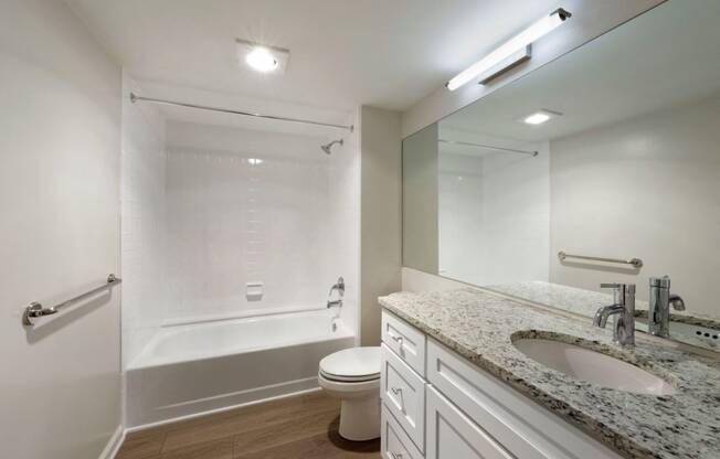 Renovated bathroom with granite countertops at Lenox Club, Arlington, 22202