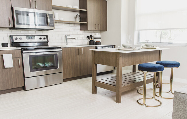 Kitchens with open display shelving and movable islands