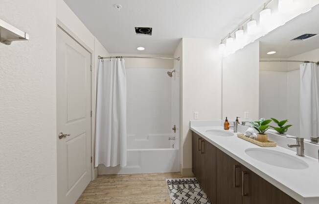 Unit Double Bathroom Vanity and Shower at Aventine Apartments in Hercules, CA 94547