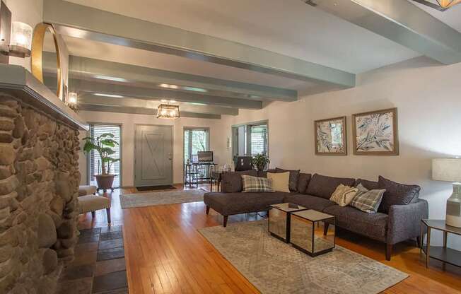 lobby interior with couch and fireplace