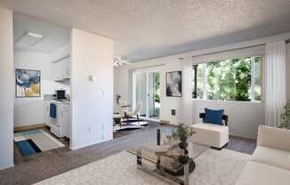 a living room with a white couch and a table