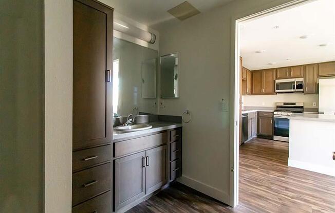 kitchen with a sink and a stove in a house at Loma Villas Apartments, San Bernardino