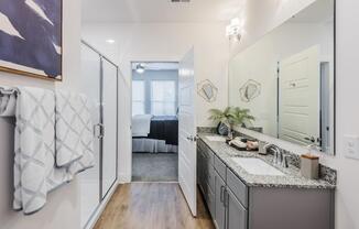 a bathroom with a sink at The Merchant Apartments, Charleston, SC