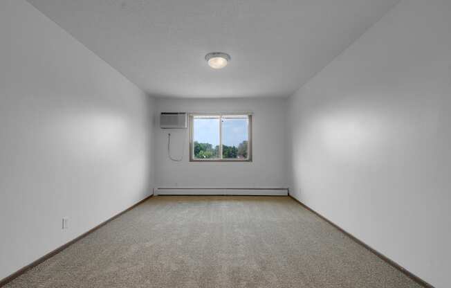 an empty room with a window