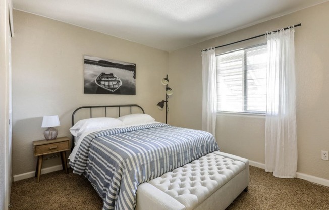 Copper Flats - Bedroom with Large Window, Spacious Closet, Full-Sized Bed, and Wall-to-Wall Plush Carpet