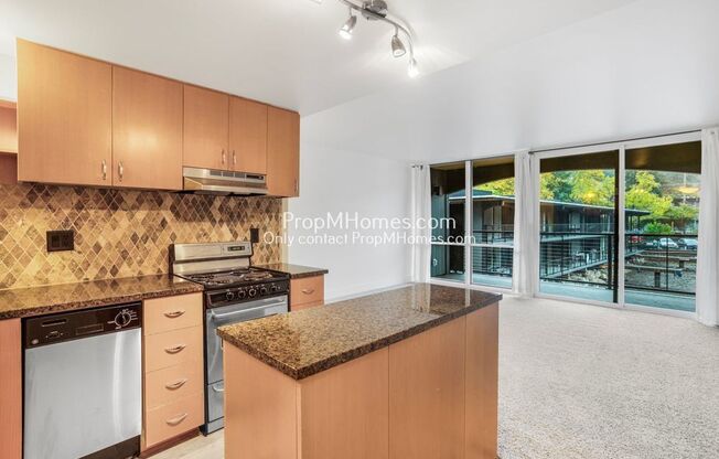 Lakefront Living – One-Bedroom Condo + Lake Access + Water/Sewer/Garbage Covered!