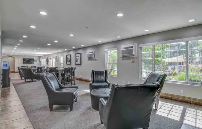 Recreation Room at Nutwood East with tables and chairs