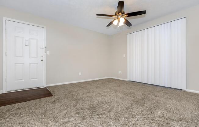 a bedroom with a large window