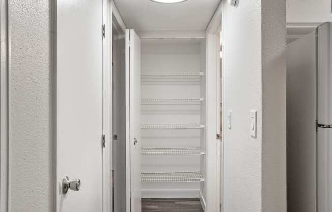 A linen closet at Horizon East Apartments