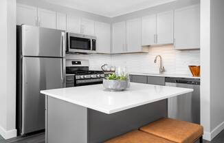 Oversized kitchen counters at Shoreham and Tides Apartments, Chicago