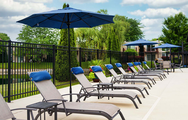 Poolside Sundeck With Relaxing Chairs at Foxboro Apartments, Wheeling, IL, 60090