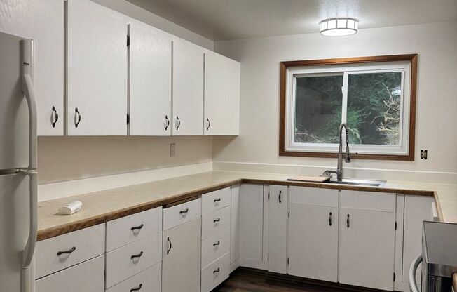 Cozy one story home on beautiful close to town acreage.