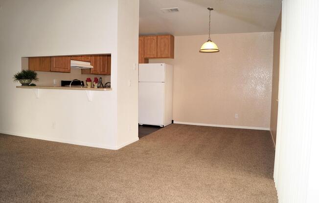 a white refrigerator freezer sitting in a room