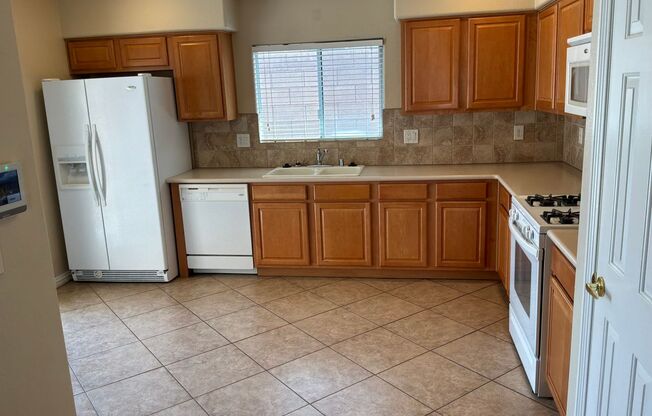 Single story Townhouse 2 bedrooms 2 bathrooms 2 car attached garage located in a gated subdivision