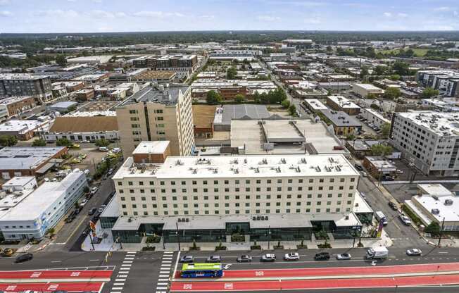 an aerial view of a large white building in a city  at The Icon, Richmond, VA