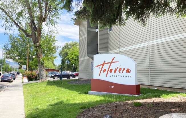 a sign in front of a building with a parking lot in the background  at Talavera, Boise, 83705