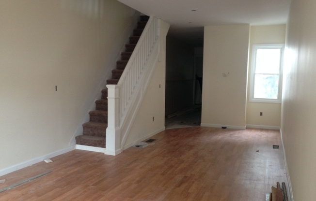 Great Home! 4 Bedrooms! Lots of Living Space! Updated Kitchen with Granite Counters! New Wood Flooring!