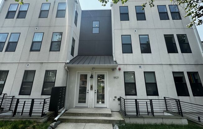 Discover this beautifully renovated 2BD/2BA FULLY FURNISHED condo in the vibrant Carver/Langston neighborhood