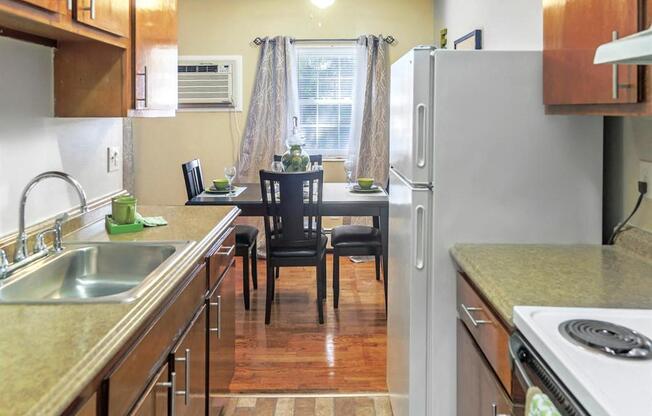 Kitchens include plenty of upper and lower cabinet space.