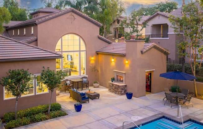 A house with a pool in the backyard.
